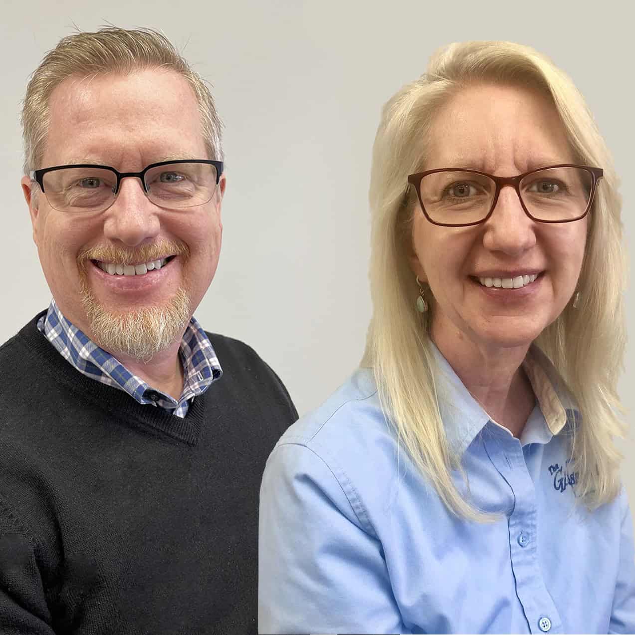 A man and a woman smiling for the camera.